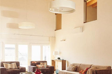 Transitional living room photo in Madrid