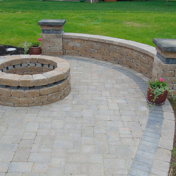 Patio with Natural Stone Steps, Seating Wall, and low voltage lighting