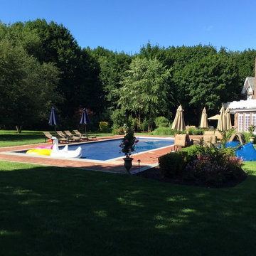 Traditional Brick Poolside Patio and Driveway