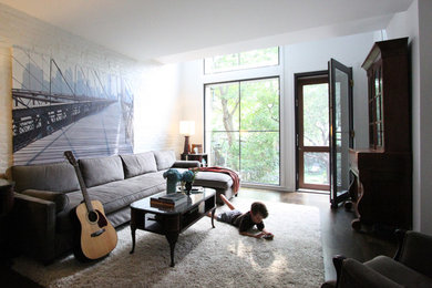 Example of a trendy living room design in New York with white walls