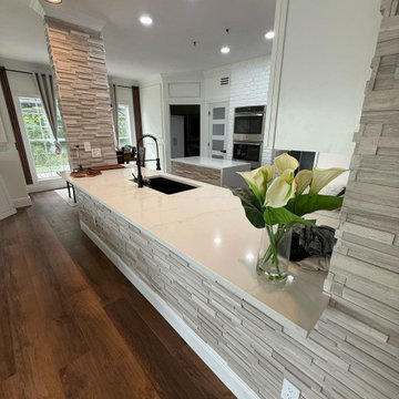 **Complete Kitchen, Flooring, Complete Stair Case and Trim