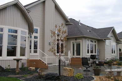 Inspiration for a gray one-story vinyl exterior home remodel in Other