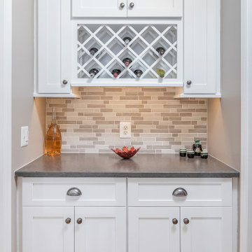 Kitchen with White Shaker Cabinetry (and WIne Rack & open shelving)