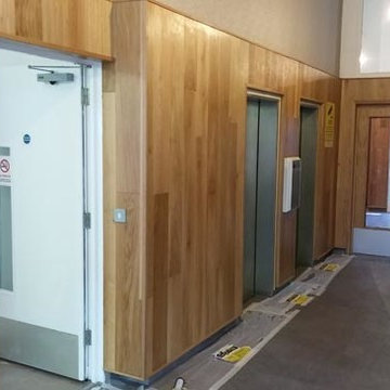 Installing Wall Cladding and Concrete Floor Tiles in Hide Tower