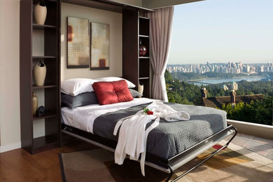 Bedroom - mid-sized transitional guest dark wood floor and brown floor bedroom idea in Orange County with beige walls and no fireplace
