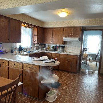 Custom Two-Toned Green and White Kitchen with Laventa Carrara Quartz Countertops