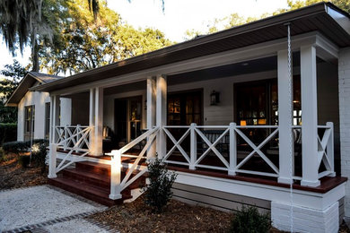 Transitional white one-story brick exterior home idea in Atlanta