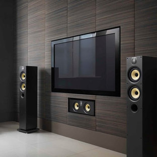 Photo of a modern open plan home cinema in Boston with ceramic flooring, a wall mounted tv and beige floors.