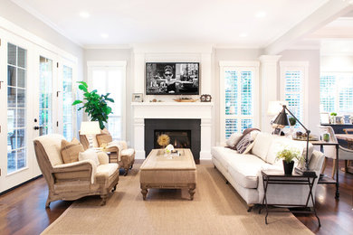 Example of a transitional living room design in Portland