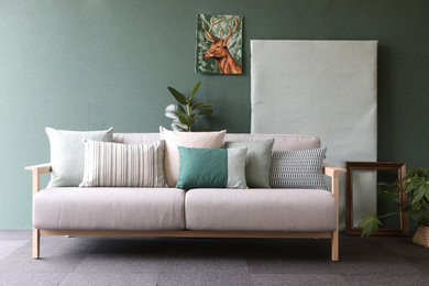 Imagen de sala de estar nórdica con paredes verdes