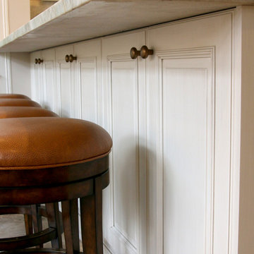 Stylish storage is tucked beneath island seating.