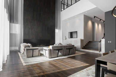 Photo of a contemporary open concept living room with medium hardwood floors, a standard fireplace, a tile fireplace surround and brown floor.