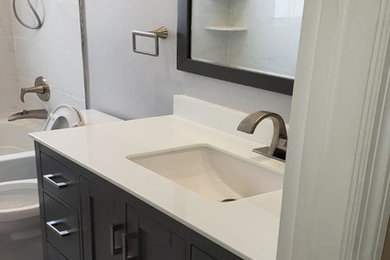 Example of a transitional bathroom design in Miami
