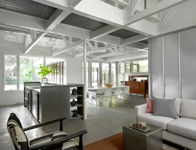 Industrial Living Room by Searl Lamaster Howe Architects