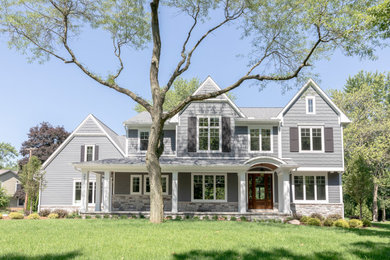Inspiration for a transitional gray exterior home remodel in Detroit