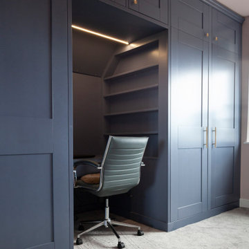 Wardrobe with integrated desk