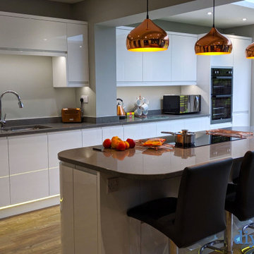An Innova Luca Gloss White Handless Kitchen - Real Customer Kitchens 2023
