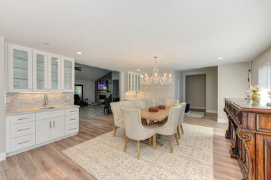 Mid-sized minimalist multicolored floor dining room photo in Sacramento with gray walls
