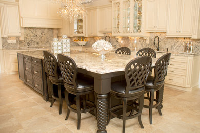 Large elegant kitchen photo in Charleston with a drop-in sink and an island