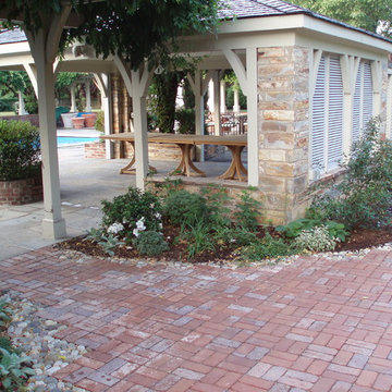 Gated Courtyard w Brick and Stone Walls and Patio