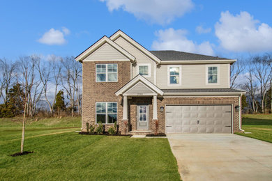 Example of a large gray two-story mixed siding house exterior design in Louisville with a hip roof, a shingle roof and a black roof
