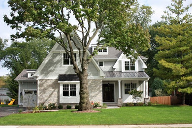 Mid-sized elegant gray two-story wood exterior home photo in Chicago with a shingle roof