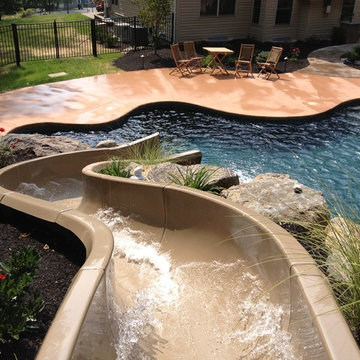 Stroud Township salt water pool with spa, sunshelf, slide, and waterfall