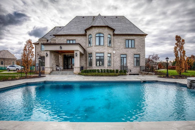 Example of a classic exterior home design in Toronto