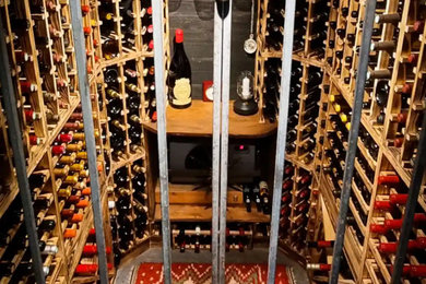 Classic wine cellar in London with display racks.
