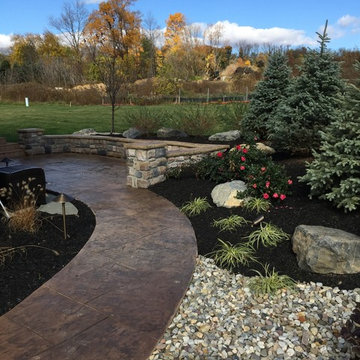 back yard added value with patio, masonry walls and plantings