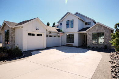 Photo of a large and white farmhouse two floor detached house in Portland with mixed cladding, a pitched roof, a shingle roof, a black roof and board and batten cladding.