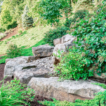 Hillside Luxury Landscaping with Linear gas Firepit