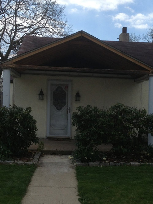 Entry door offcentered to porch roof pitch