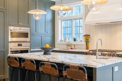 Inspiration for a country kitchen remodel in New York with marble countertops and an island