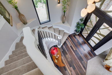 Example of a large transitional staircase design in Seattle