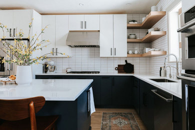 Inspiration for a modern kitchen remodel in Denver with flat-panel cabinets and blue cabinets