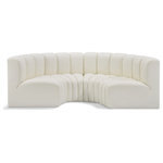 Meridian Furniture - Arc Vegan Leather Upholstered 4-Pc. Inward Curved Modular Sectional, Cream - Unleash modern opulence with the Arc Vegan Leather 4pc. Sectional. Crafted for the modern connoisseur, this Sectional injects an air of refined luxury into any space. Its sleek silhouette, upholstered in supple cream vegan leather, exudes timeless sophistication while the deep channel tufting adds textural intrigue, further elevating the chair's visual appeal. The modular design makes it a versatile chameleon, effortlessly adapting to your evolving needs and preferences. Whether you envision it gracing a chic living room corner, basking in the glow of a bedroom window, or adding a touch of drama to a home office, the Arc seamlessly complements your unique interior aesthetic.