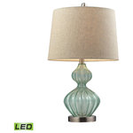 Elk Home - 25" Smoked Glass LED Table Lamp, Pale Green - This lamp is part of a collection that integrates the glamour of an exotic getaway with the casual comfort of a weekend at the beach house. Rustic toile patterns in tonal blues are paired with batik inspired textiles that are all rich and graphic in feeling. The Pale Green Smoked Glass Table Lamp is topped with a round hard back shade in metallic linen. The base measures 13"W x 13"D x 25"H with shade measurements of 13''W x 13"D x 10"H. Requires one 9.5 LED medium base bulb (included).