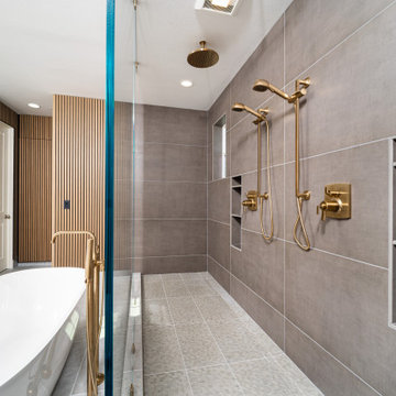 Elegant master bathroom with large format tile