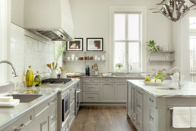 Inspiration for a modern l-shaped eat-in kitchen remodel in St Louis with an undermount sink, recessed-panel cabinets and gray cabinets