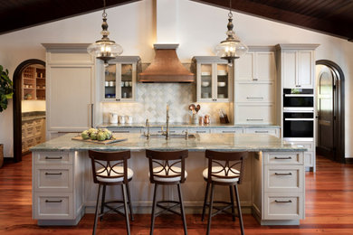 Example of a tuscan kitchen design in San Diego