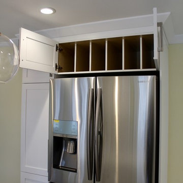 Tray dividers over refrigerator