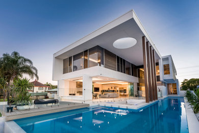 Design ideas for a modern pool in Gold Coast - Tweed.