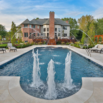 Barrington Hills, IL Scalloped Edge Pool with Round Hot Tub and Sunshelf