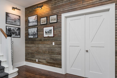 Mid-sized transitional u-shaped dark wood floor and brown floor open concept kitchen photo in Other with an undermount sink, shaker cabinets, white cabinets, quartz countertops, white backsplash, ceramic backsplash, stainless steel appliances and an island
