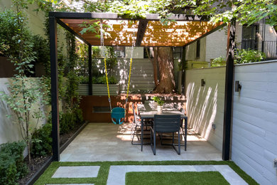 Patio - modern patio idea in Toronto