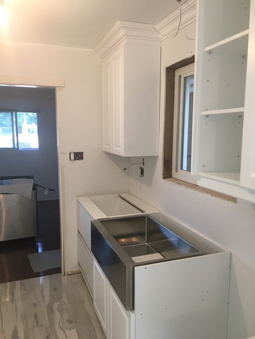 quartz installation around apron sink