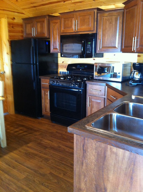 Need help with the kitchen. Should I paint the pine walls or cabinets