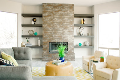 Large transitional open concept porcelain tile living room library photo in New Orleans with white walls, a standard fireplace, a tile fireplace and no tv
