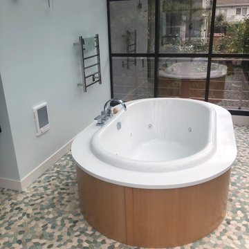 Custom Oval Jetted Tub Surrounded in Maple